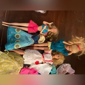 Vintage Barbie dolls and clothes and shoes